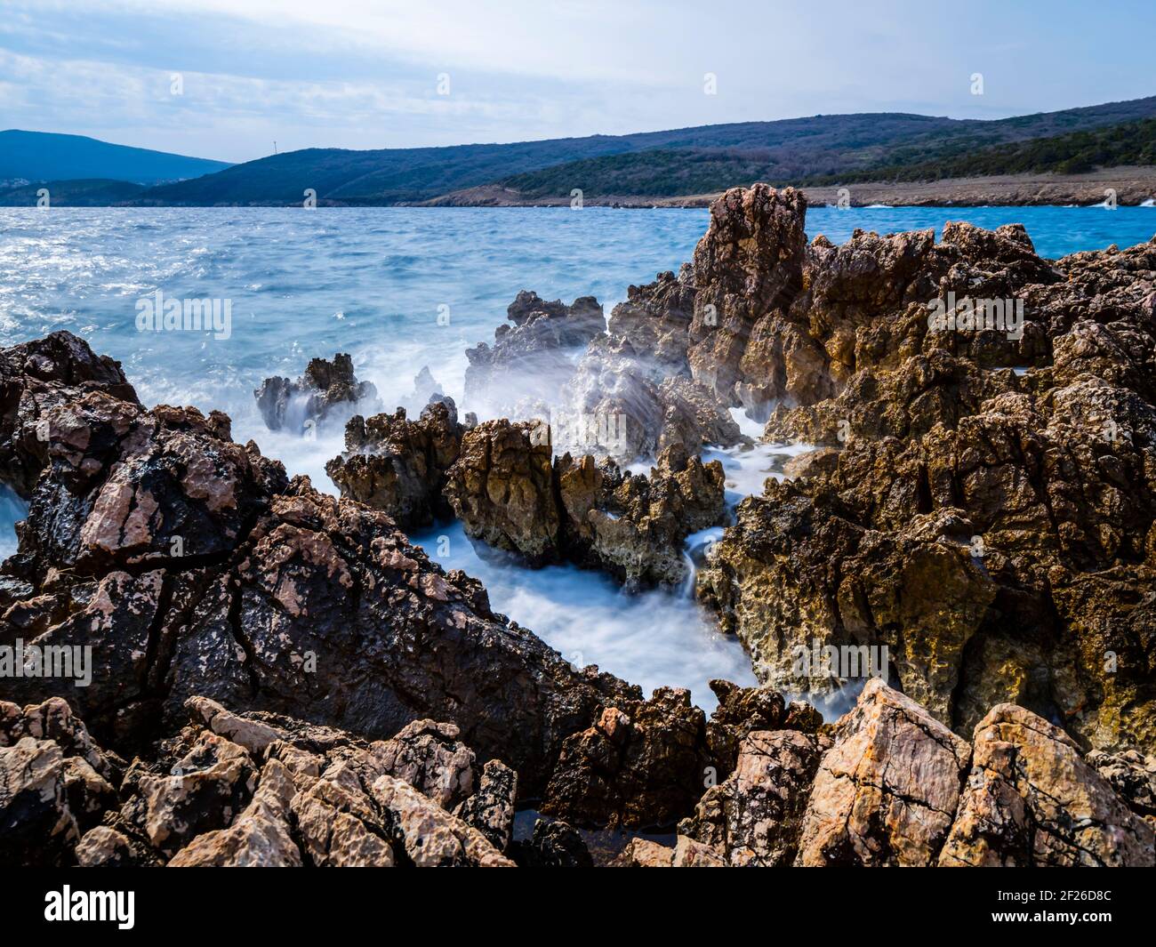 Rough dangerous rocky sea coastline coast Risika on island Krk in Croatia Europe Stock Photo