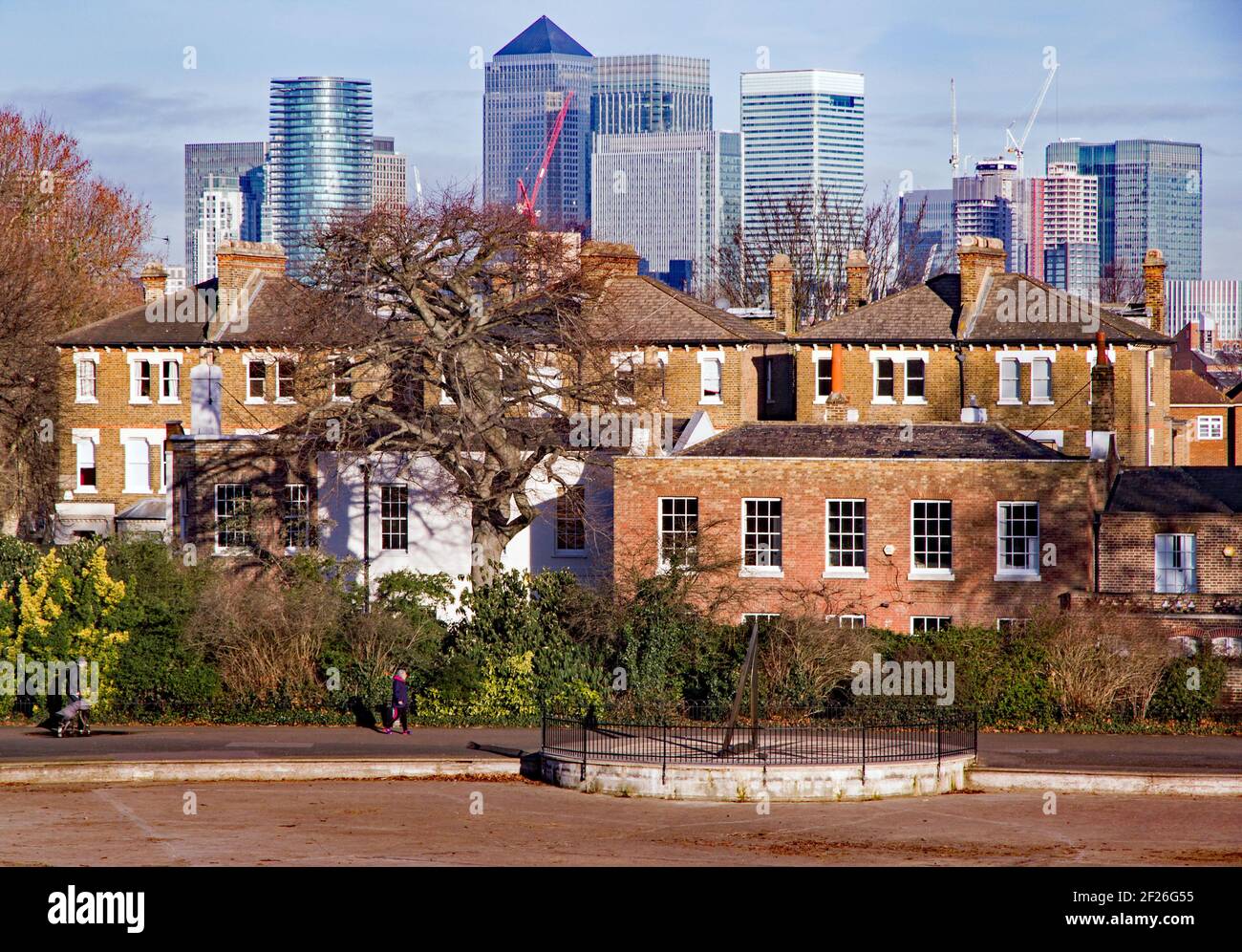 Contrast between Victorian and Edwardian houses in Greenwich, London, England, and the skyscrapers of Isle of Dogs or docklands area in the background Stock Photo