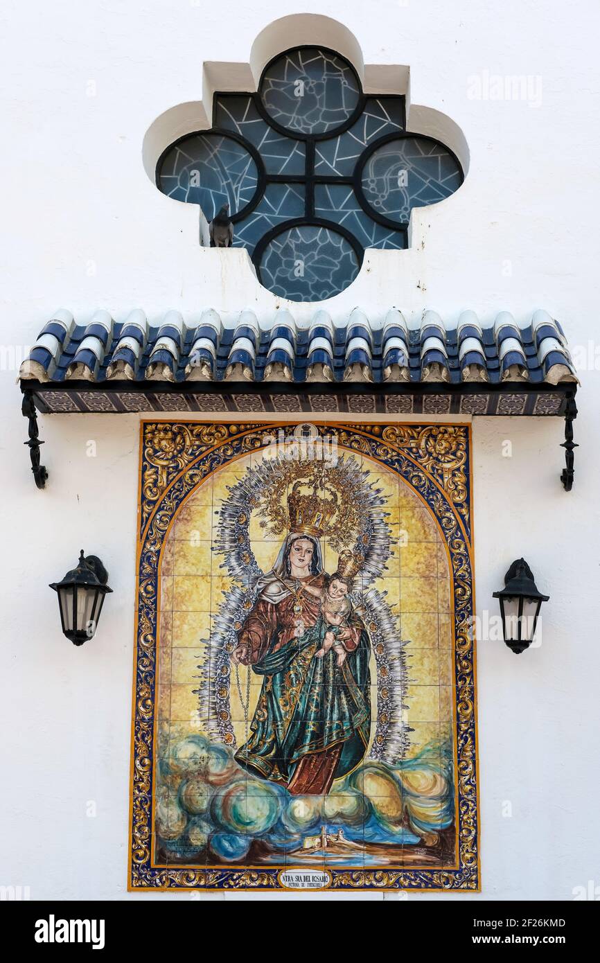Religious Painting outside the Church of Nuestra Senora del Rosario in Fuengirola Stock Photo