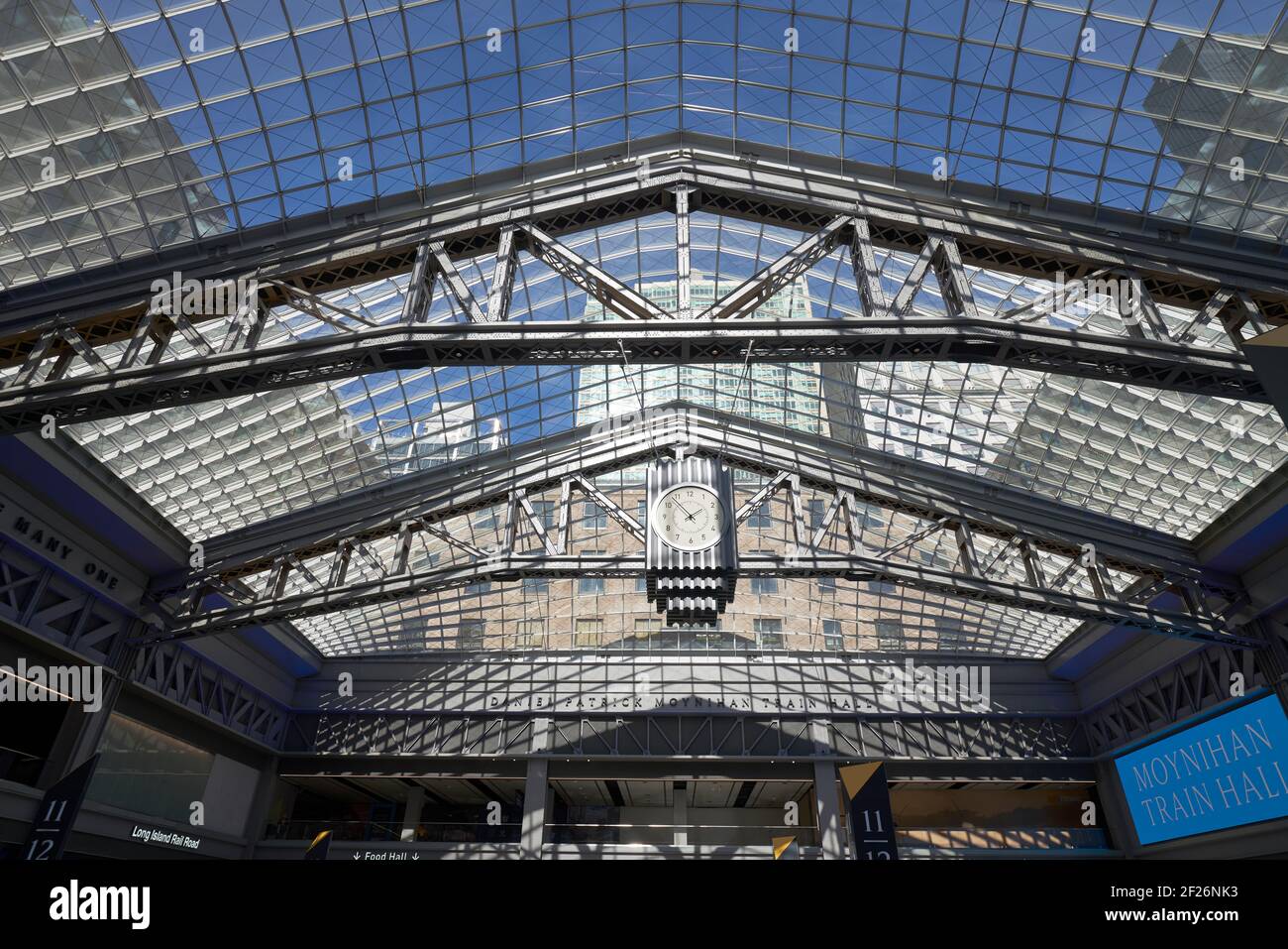 Glass roof over the interior of the Moynihan train hall at Penn Station in New York City. Stock Photo