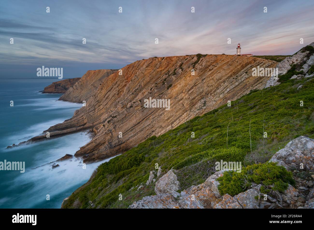 Cabo Espichel cape at sunset with sea cliffs and atlantic ocean landscape, in Portugal Stock Photo