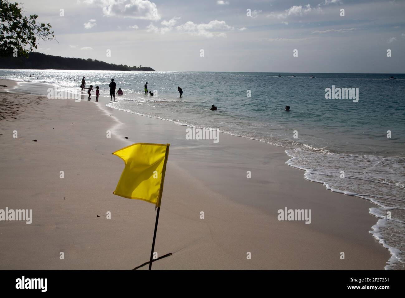 yellow flag grand anse beach st george grenada windward islands west indies Stock Photo
