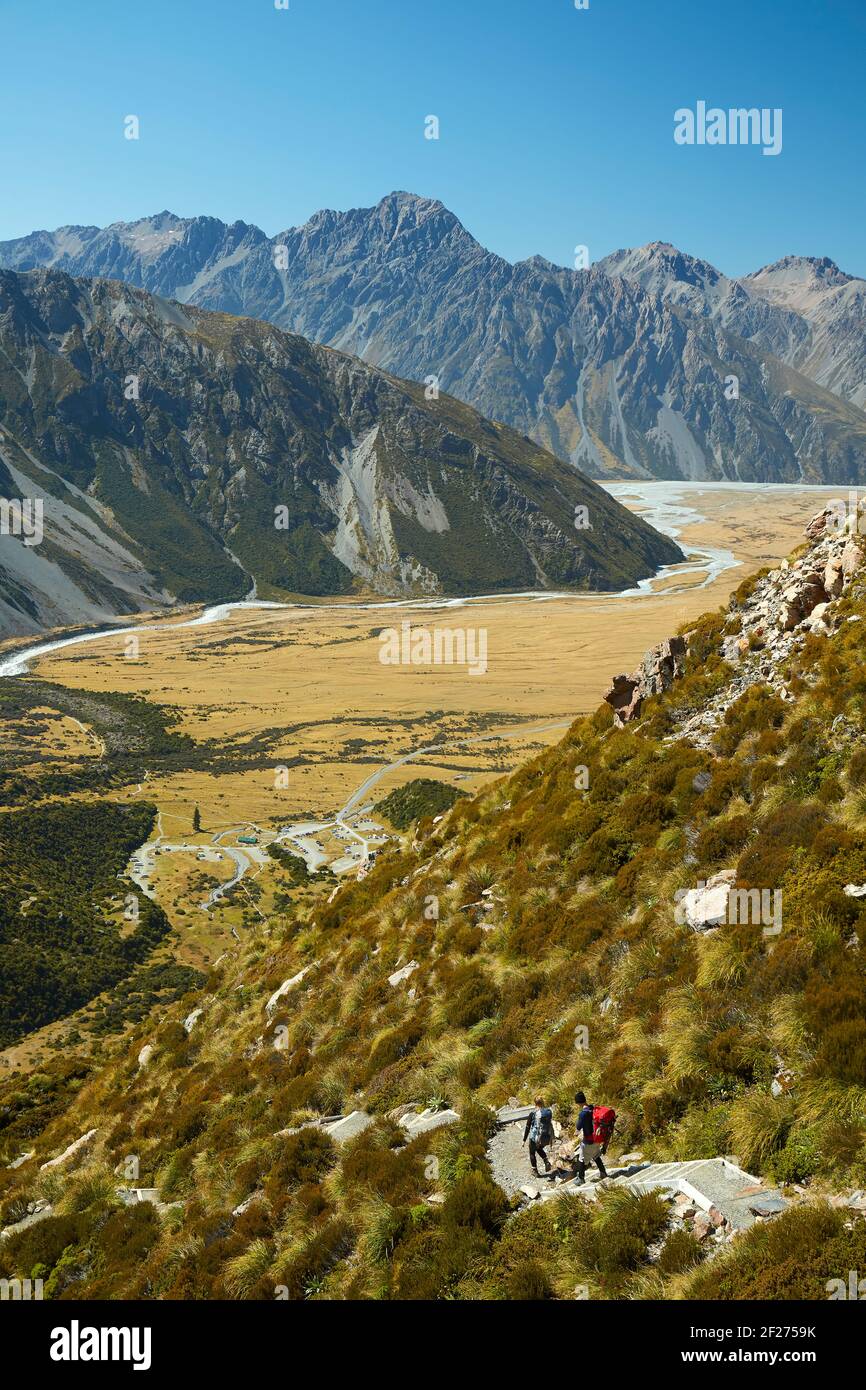Hikers on track to Sealy Tarns and Mueller Hut, Aoraki / Mount Cook National Park, South Island, New Zealand (model released) Stock Photo