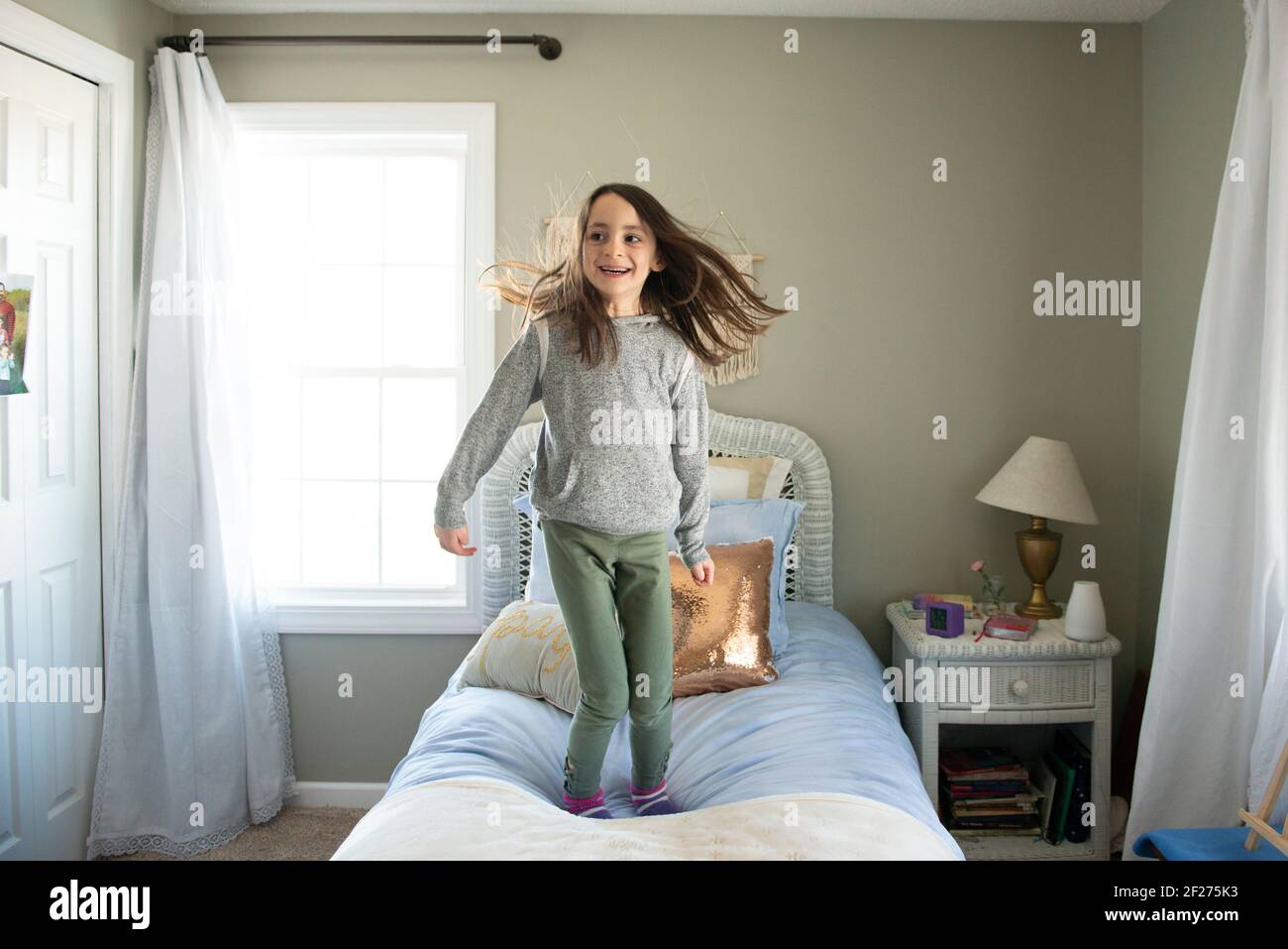 Kids jumping on bed hires stock photography and images Alamy
