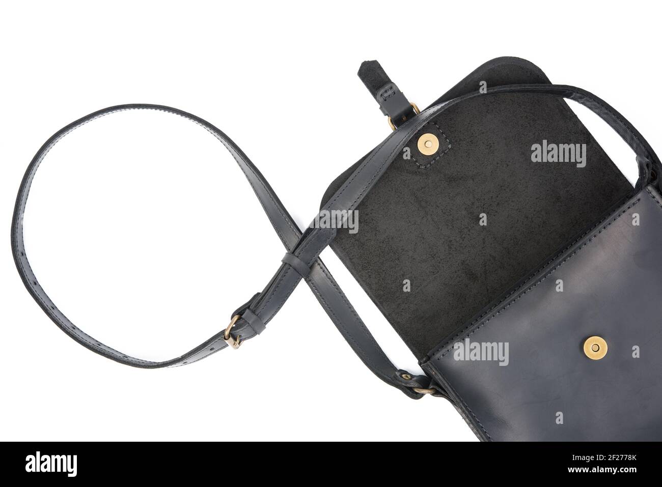 Black leather bag with long shoulder strap, accessory isolated on white