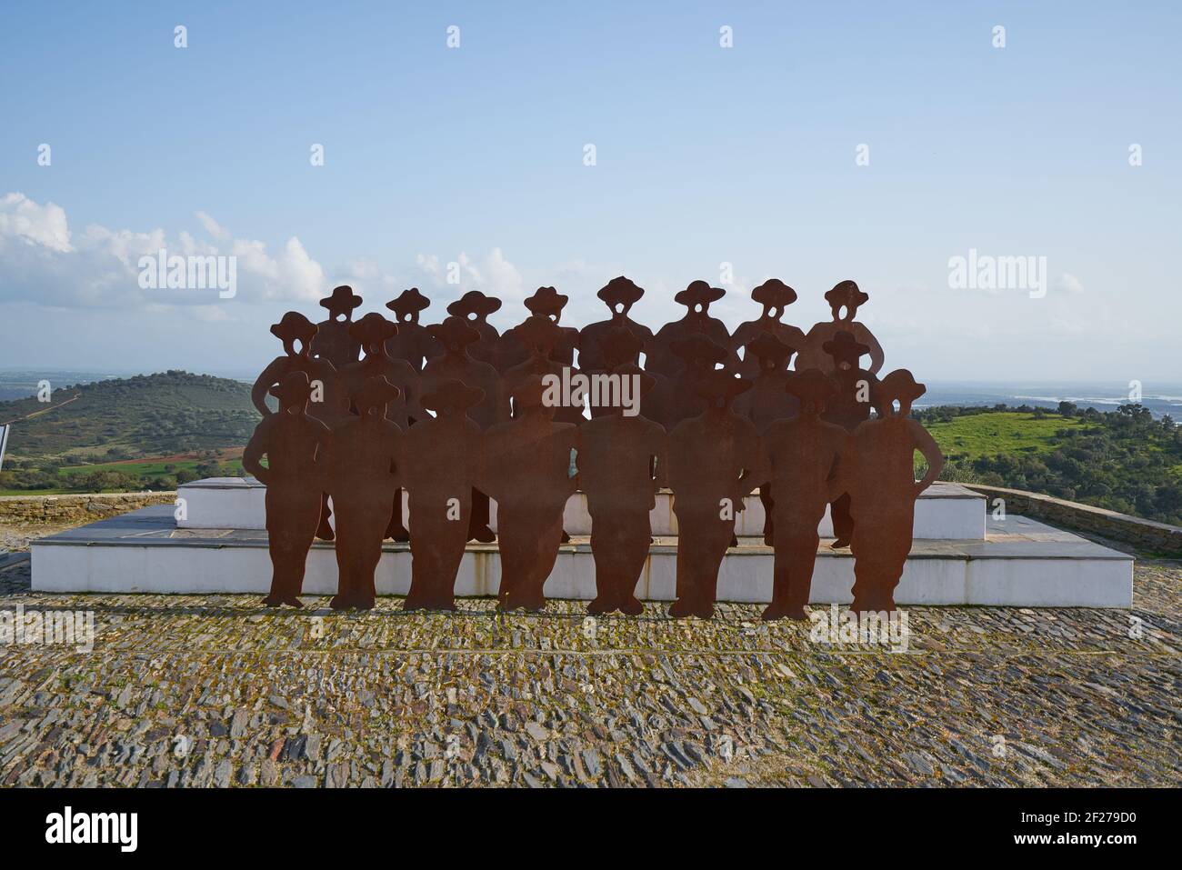 Monsaraz canto alentejano singing men with the village on the background in Alentejo, Portugal Stock Photo
