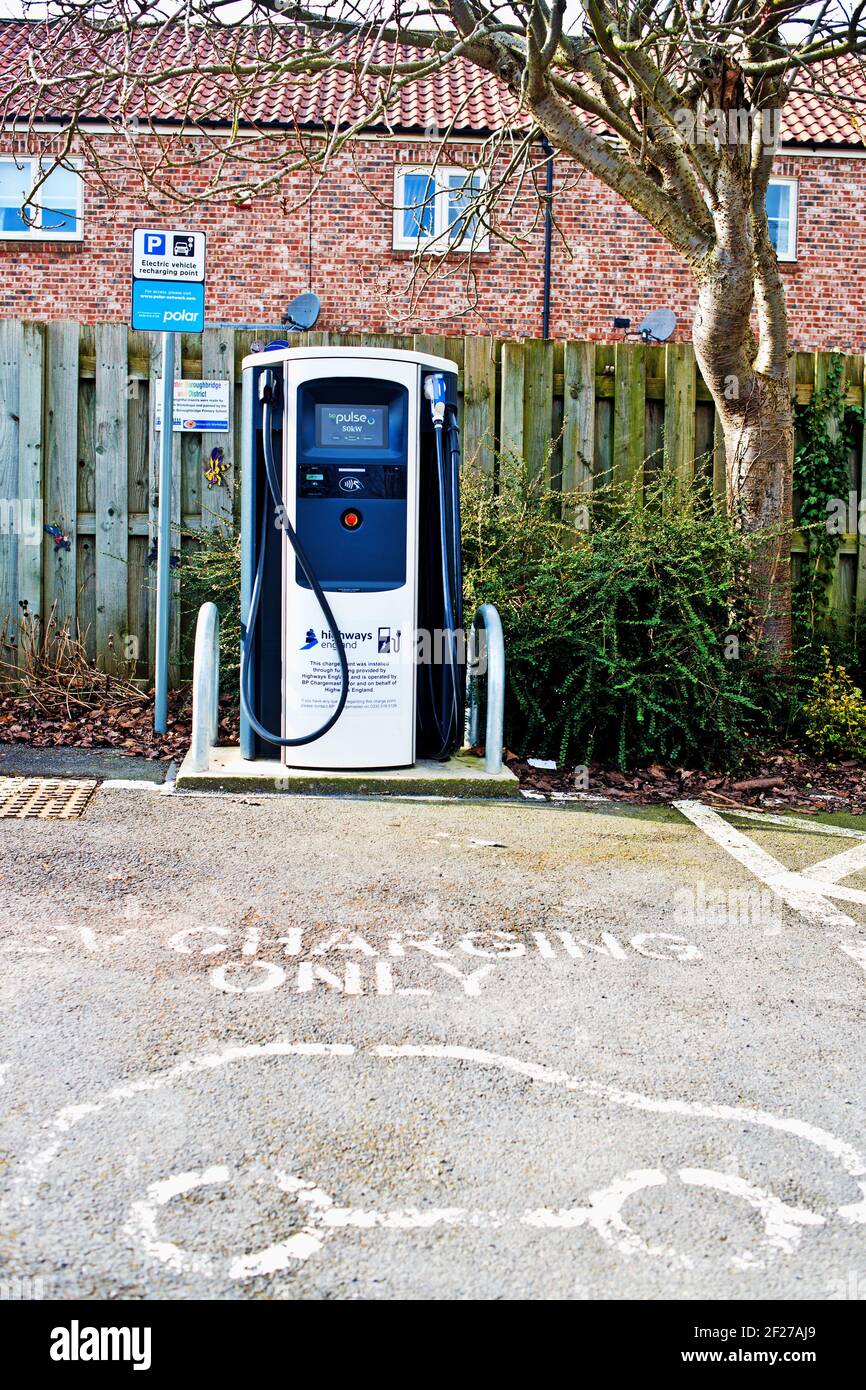 Electric car charging point, car park, Boroughbridge, North Yorkshire