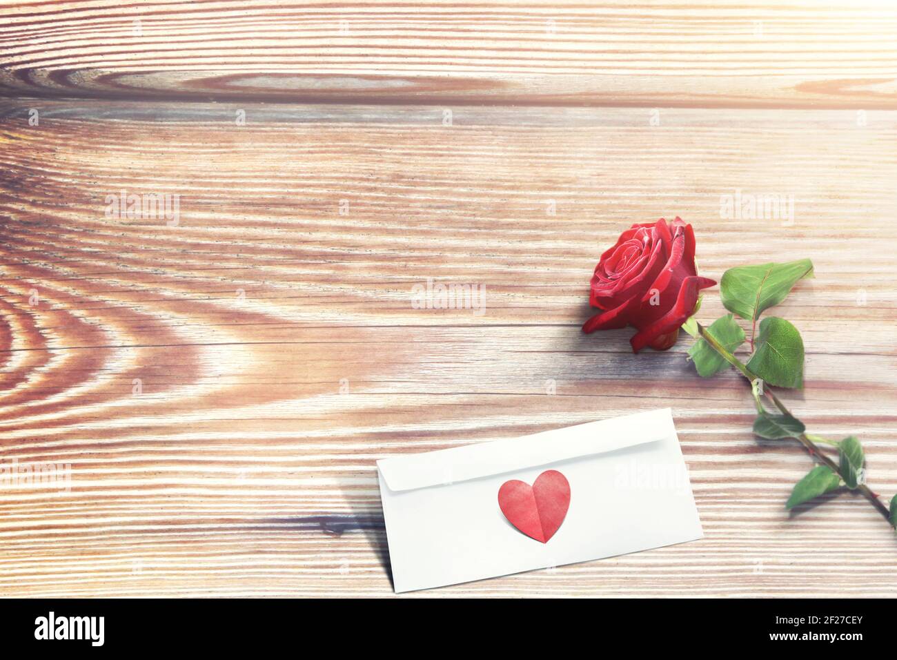 Rose flower and vintage love letter. I love you valentine card. Stock Photo