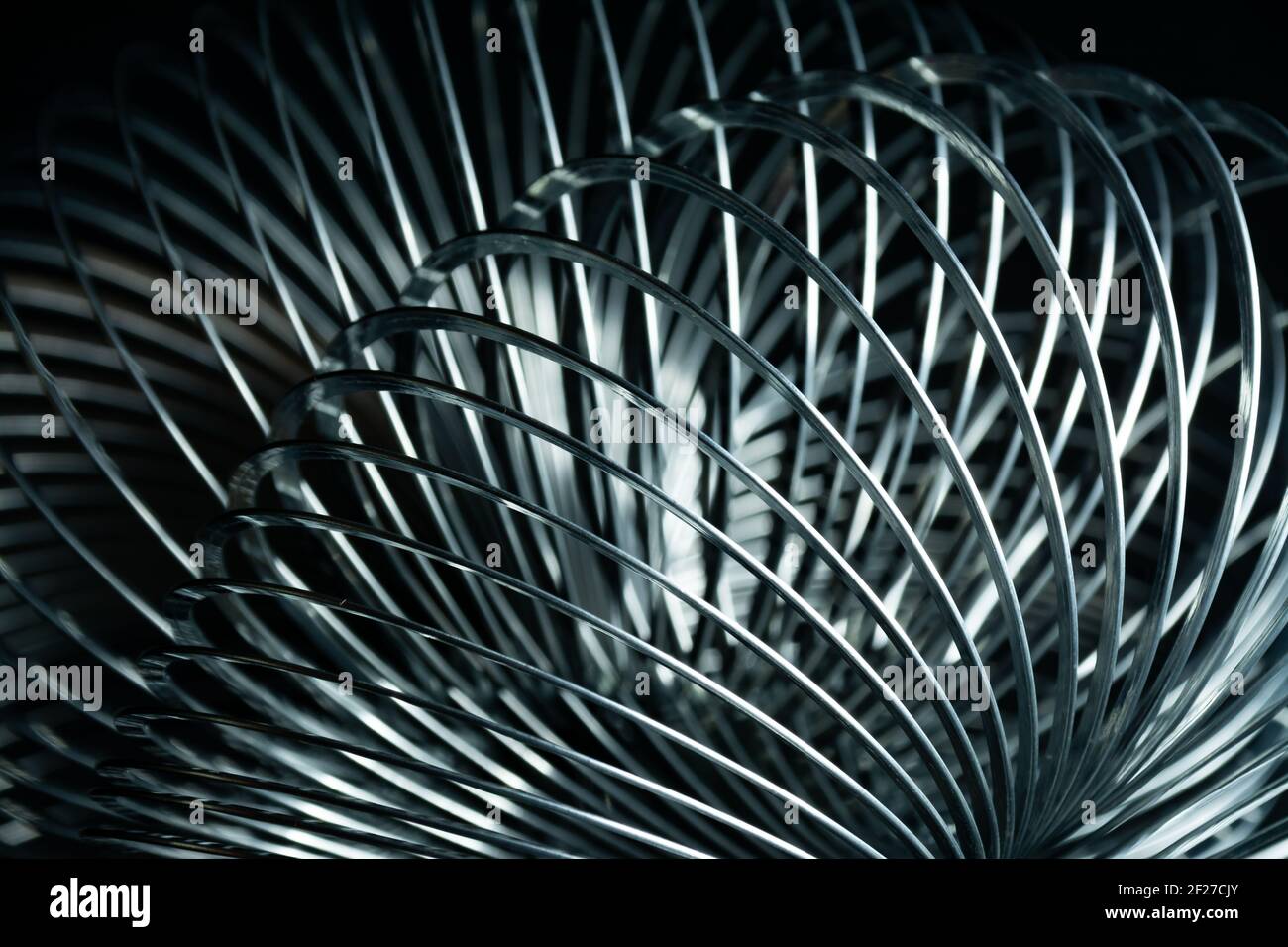 Abstract metal spirals with black background. Stock Photo
