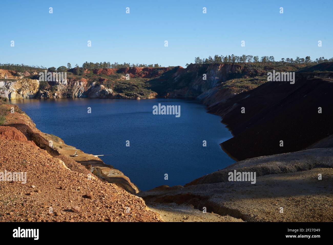Contaminated pond lake of an old abandoned mine red landscape in Mina de Sao Domingos, Portugal Stock Photo