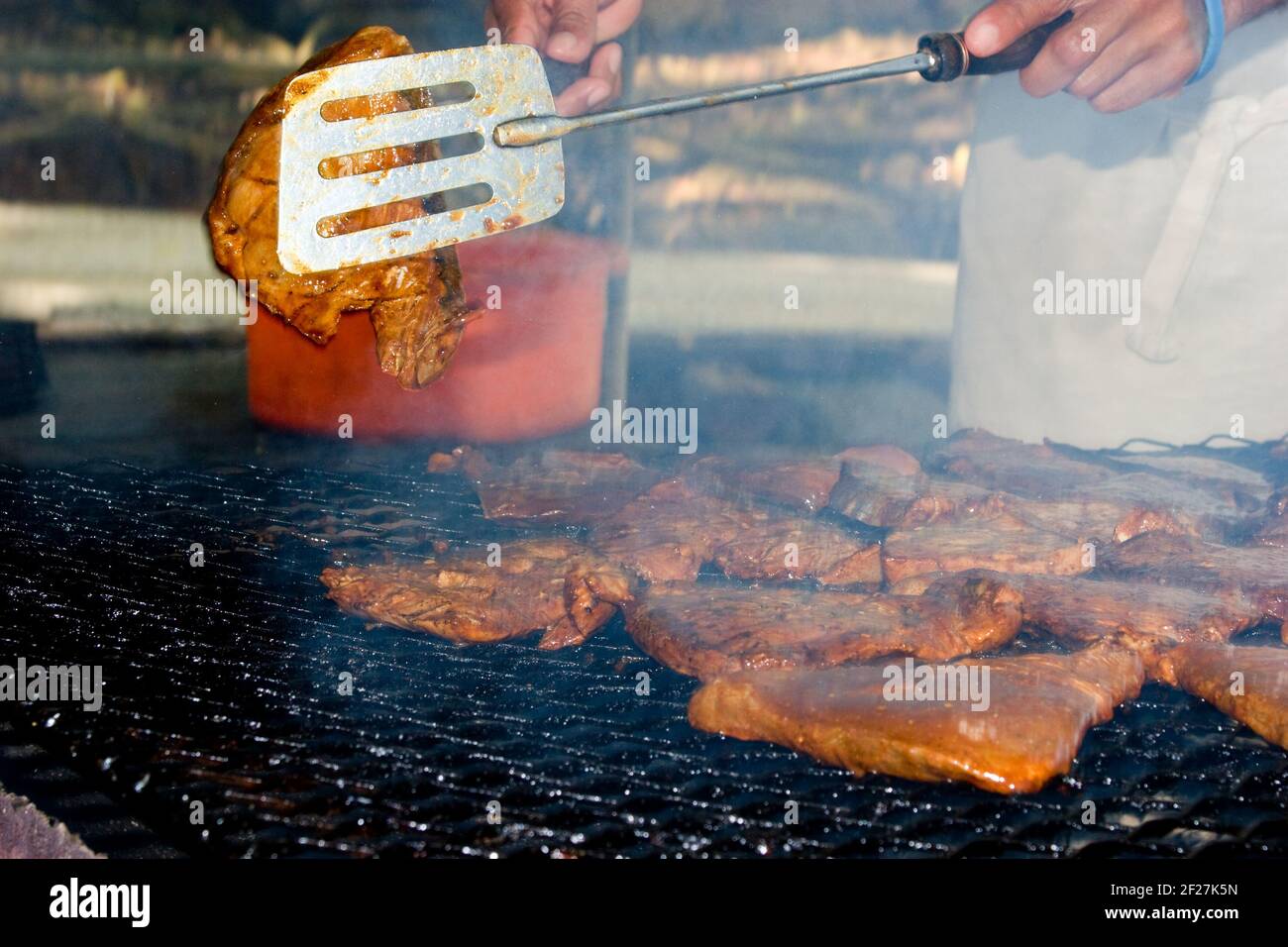 Preparation of a tuna on fire Stock Photo Alamy