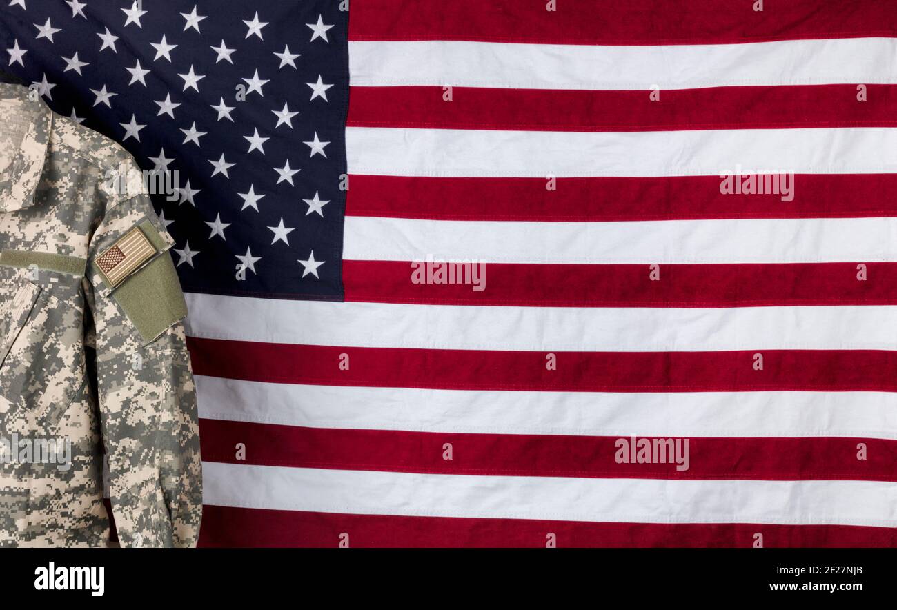 Military uniform shirt with cloth US flag in background Stock Photo Alamy