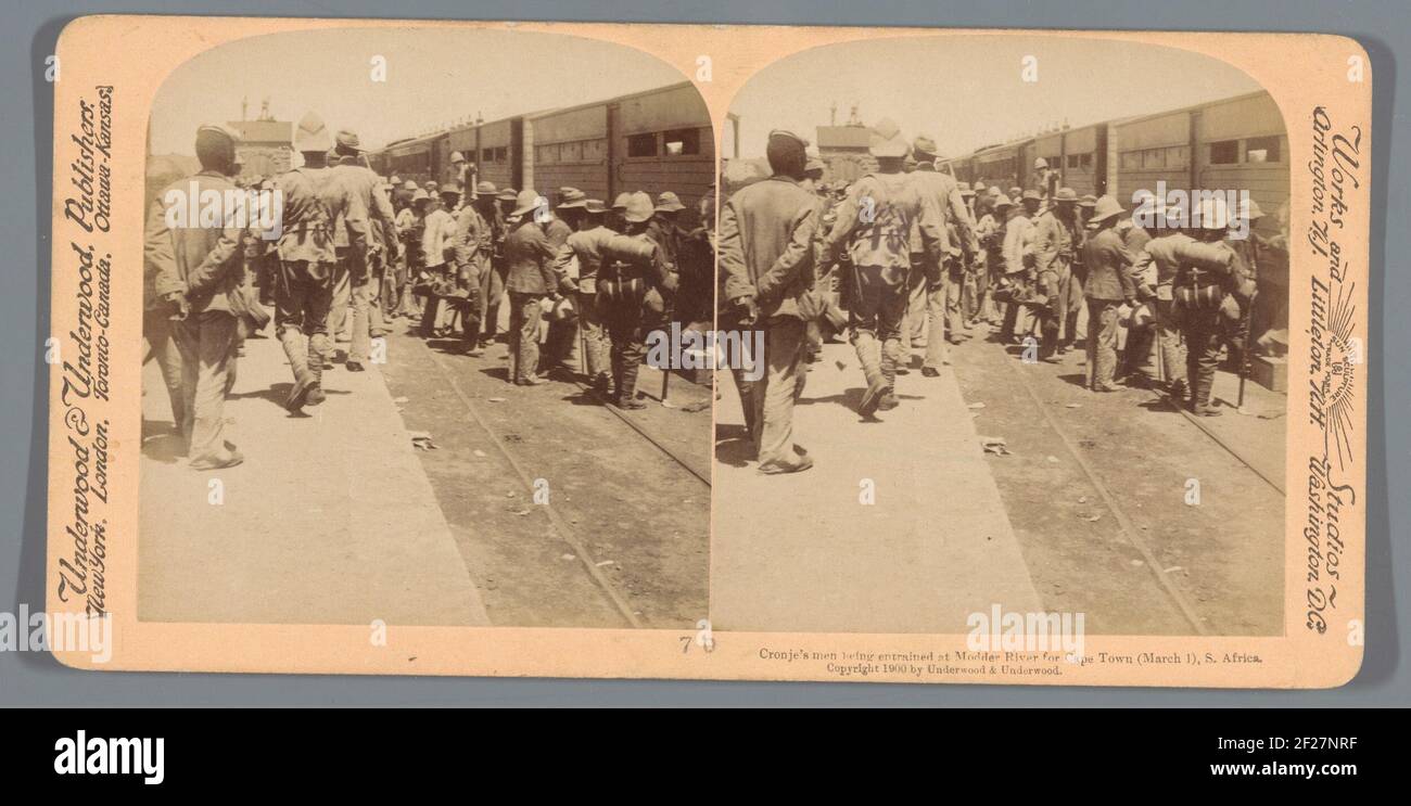 Cronje's men, brave prisoners of War, being entrained at Modder River for Cape Town (March 1), S. Africa.. Stock Photo