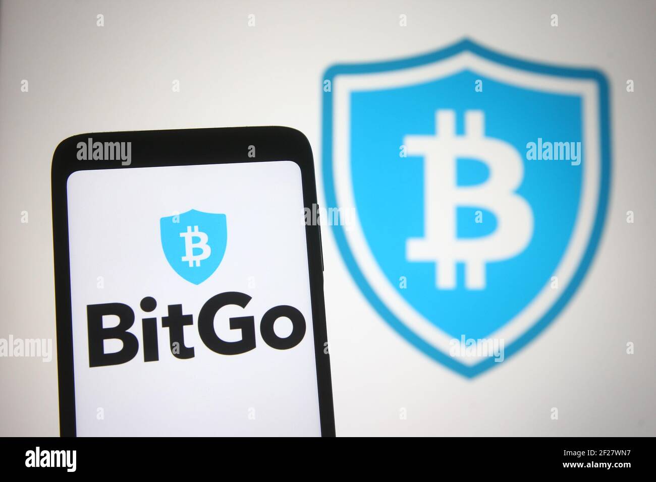 Ukraine. 10th Mar, 2021. In this photo illustration, the BitGo logo of a  digital asset trust company and security company seen displayed on a  smartphone and a pc screen. Credit: Pavlo Gonchar/SOPA