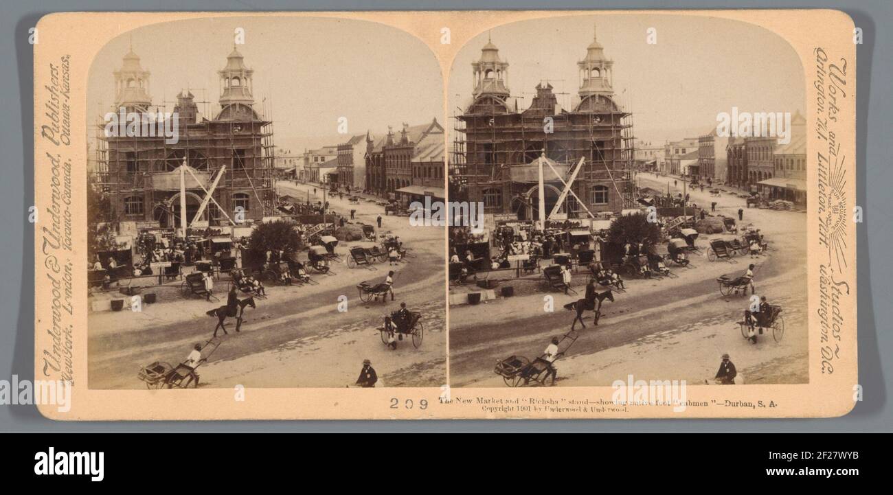 View of a market hall under construction in Durban; The New Market and 'Richsha' Stand - Showing Native Foot 'Cabmen' - Durban, S.A ... Stock Photo