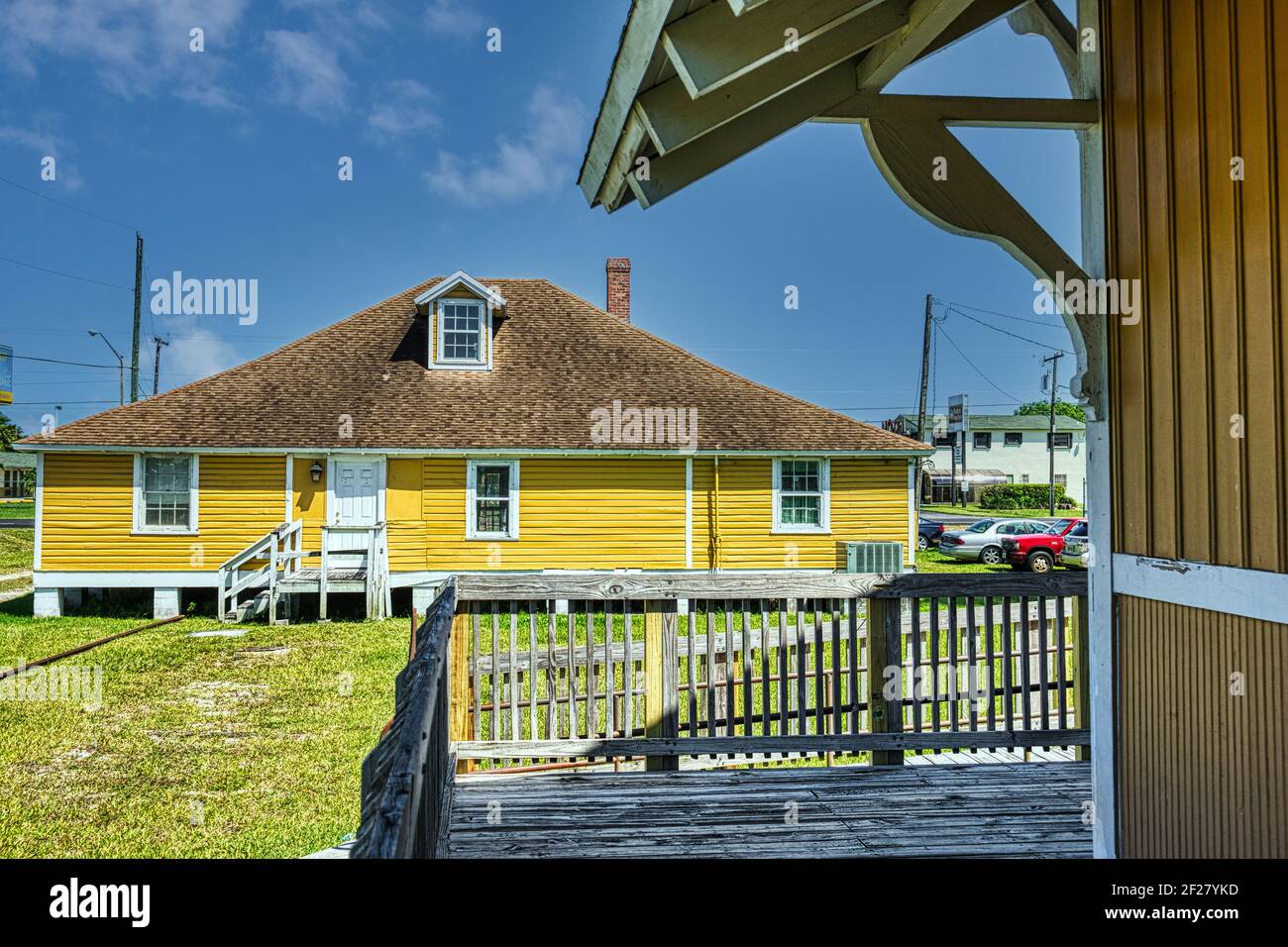 The historic Florida East Coast Railway Homestead agent’s house, now the Florida Pioneer Museum, from the replica of the Homestead Depot located in Fl Stock Photo