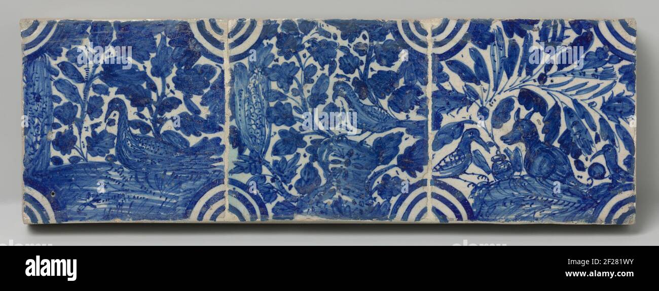 Veld van drie tegels.Field of 3 tiles (3 x 1) each with a blue painted Chinese landscape framed by a circle inside a field. In the corners, Meander ornament. Stock Photo
