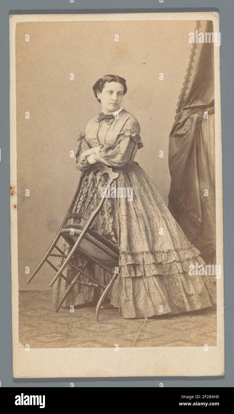 Portrait woman with chair .. Stock Photo