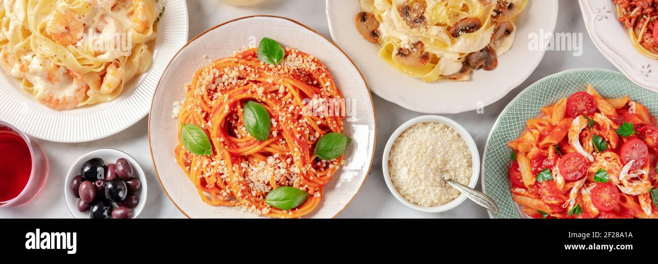 Italian food panorama. Various pastas, olives, and Parmesan cheese Stock  Photo - Alamy