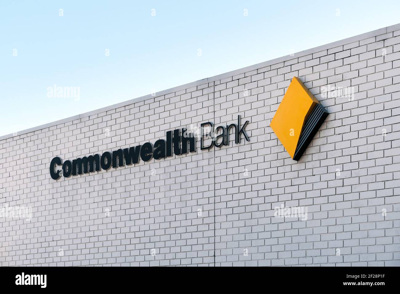 Adelaide, South Australia - August 17, 2019: Commonwealth Bank branch logo sign above the entrance near Unley shopping center Stock Photo