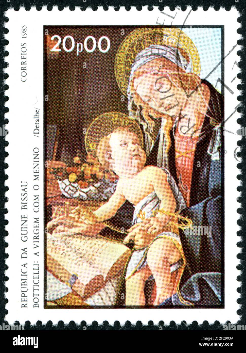 GUINEA-BISSAU - CIRCA 1985: A stamp printed in Guinea-Bissau, shown the painting by Botticelli (detail) - Virgin and Child, circa 1985 Stock Photo