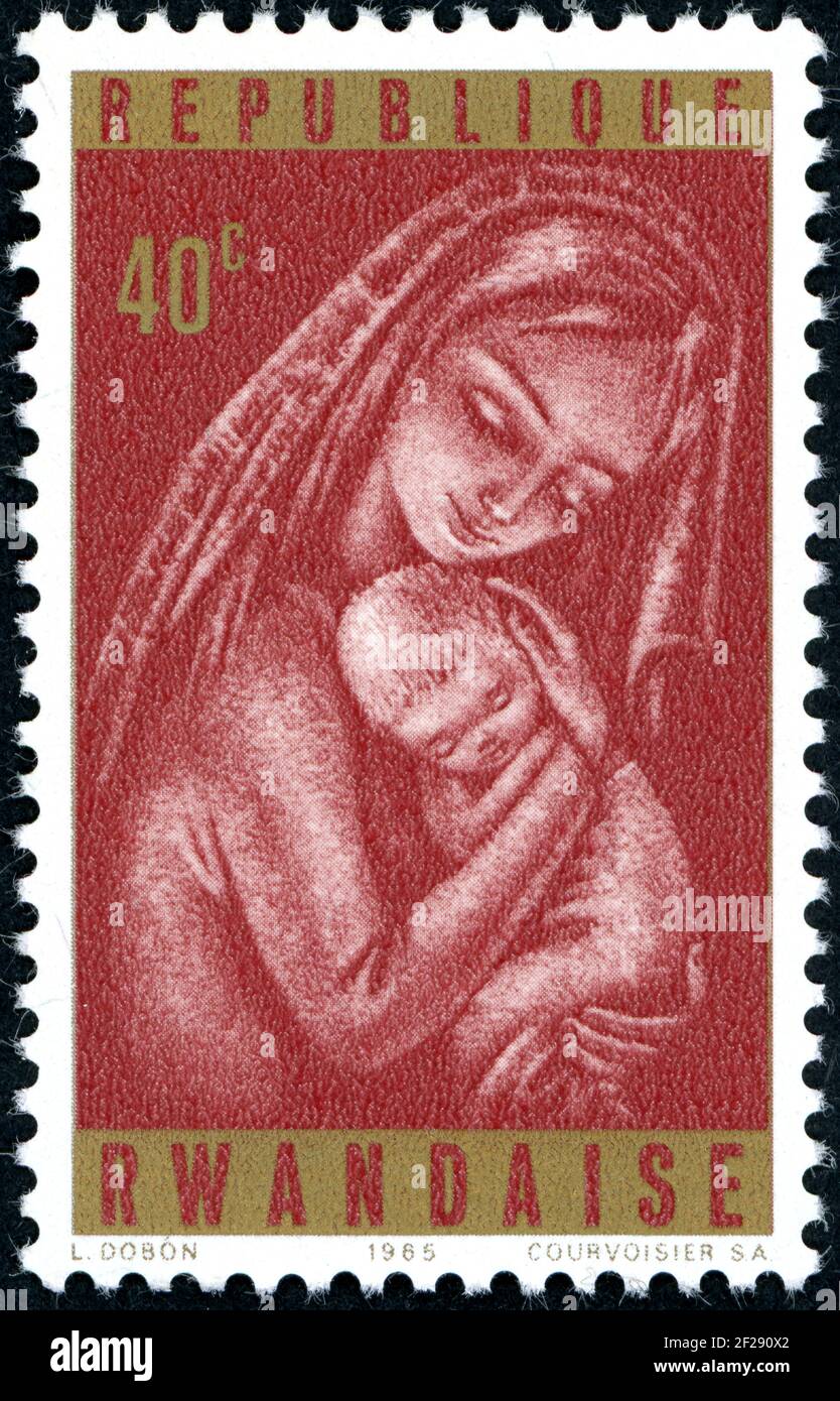 RWANDA - CIRCA 1965: Postage stamp printed in Rwanda, Christmas Issue, shows Madonna and Child, circa 1965 Stock Photo