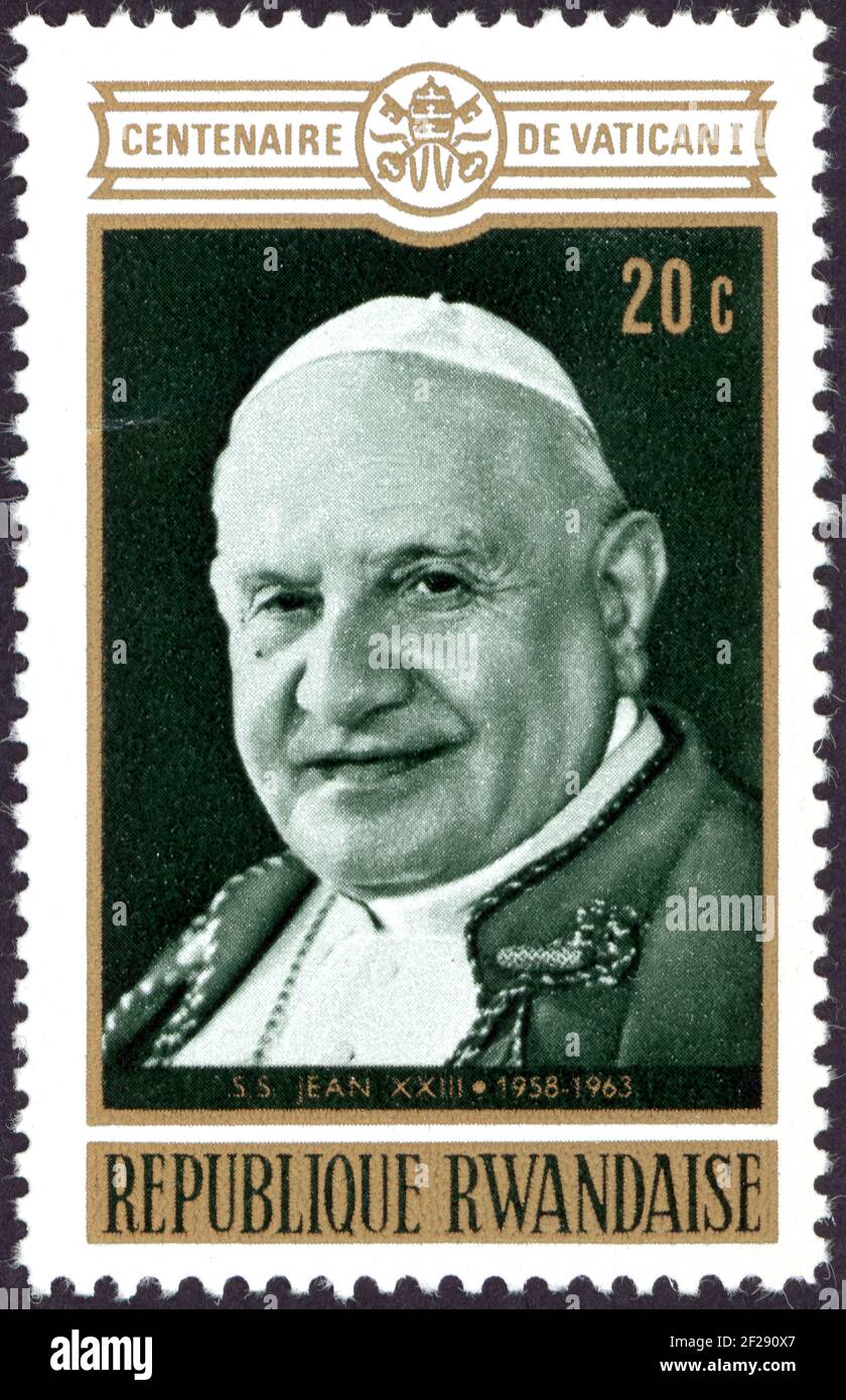 A stamp printed in Rwanda, dedicated to the 100th anniversary of the first Vatican Council, shown the portrait of Pope John XXIII (1959-1963) Stock Photo