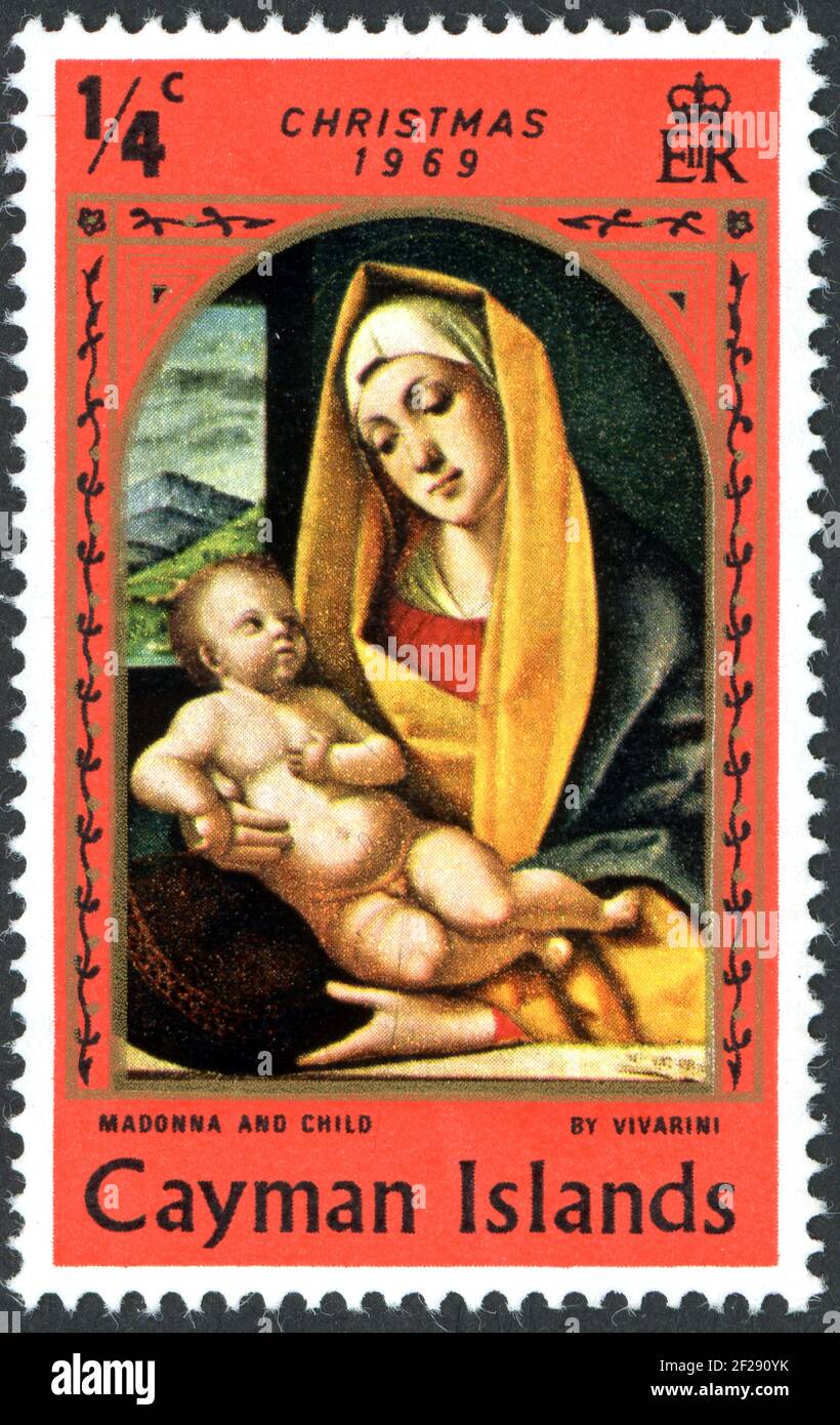 CAYMAN ISLANDS - CIRCA 1969: A stamp printed in Cayman Islands, Christmas issue, shown the painting by Alvise Vivarini - The Virgin and Child (1483), Stock Photo