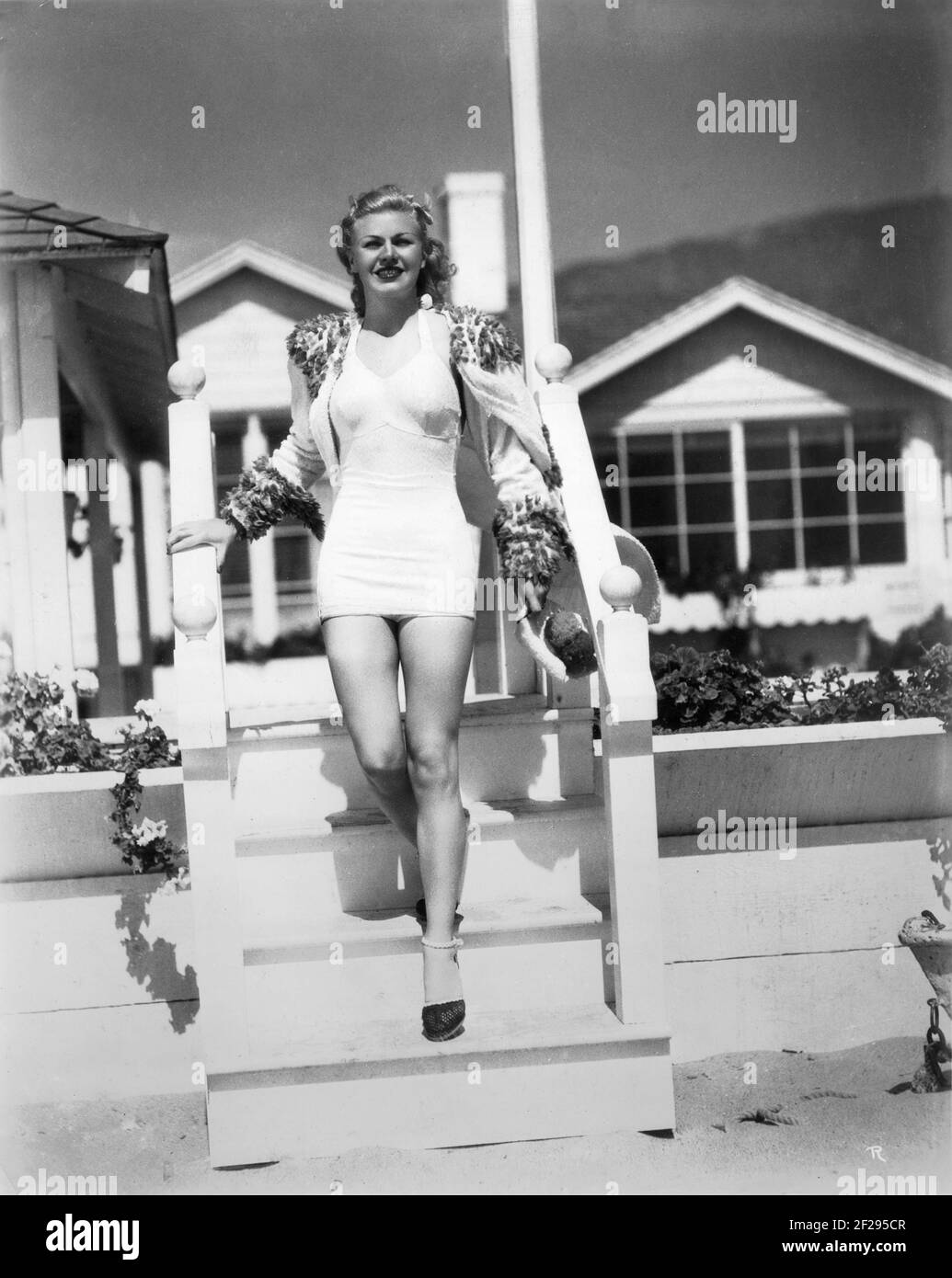 GINGER ROGERS 1938 candid swimsuit full length portrait at home by JOHN MIEHLE publicity for RKO