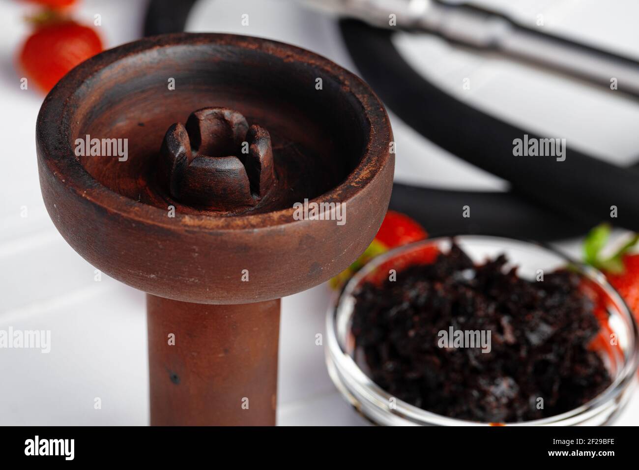 Empty hookah shaft close up on table with fresh fruit Stock Photo