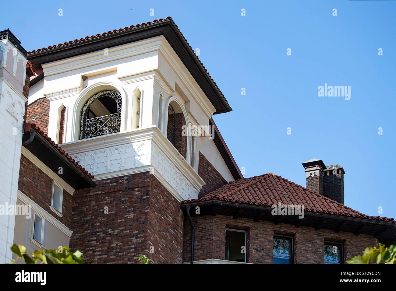 Interesting building in colonial style Stock Photo - Alamy