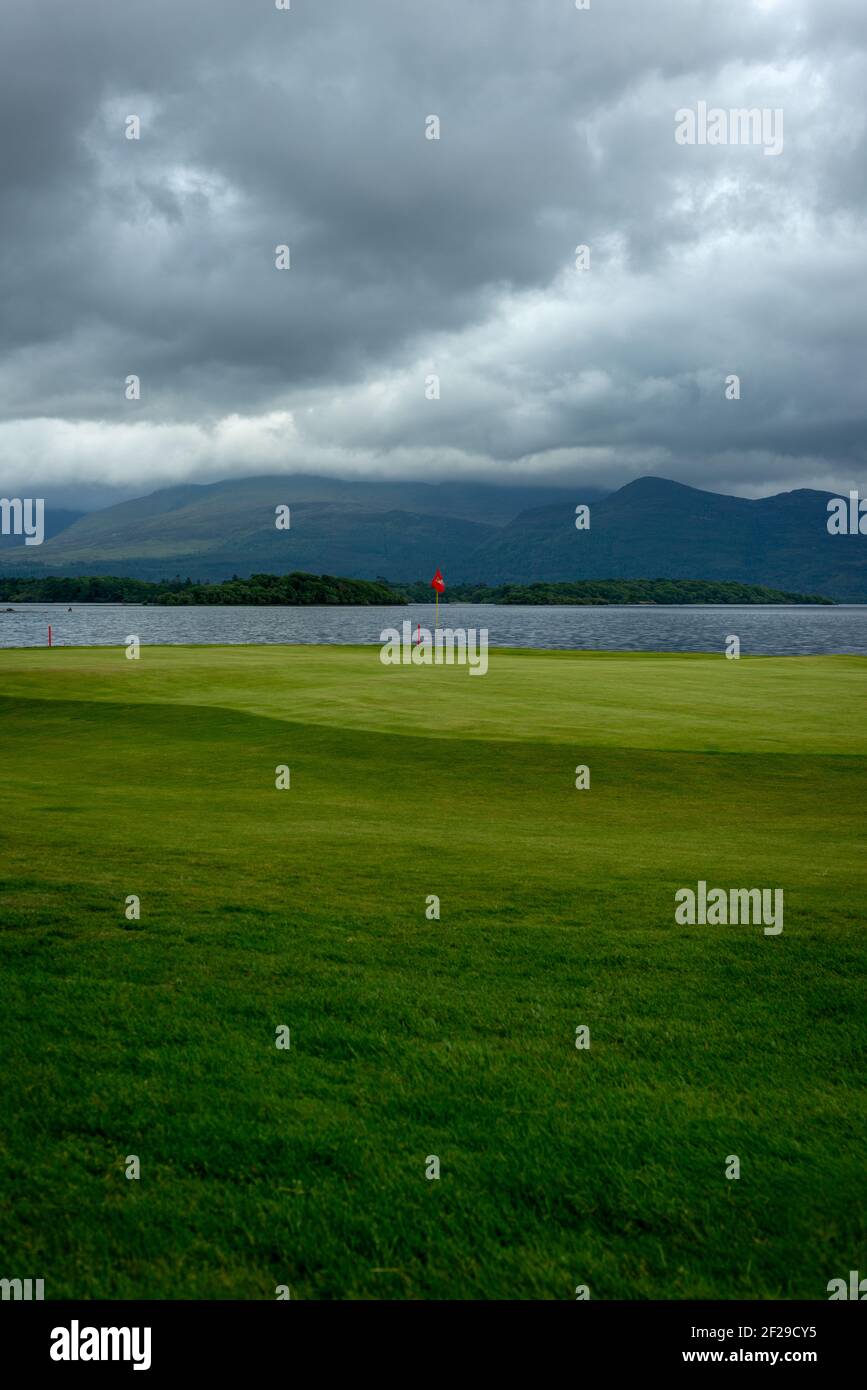 Golf and Fishing Club in Fossa, Killarney golf course landscape at Lough Leane lakeshore and Mangerton Mountain in Killarney National Park, Ireland Stock Photo