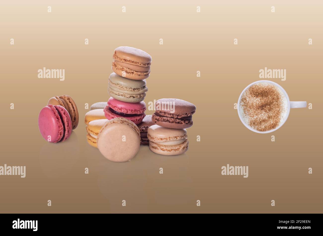 macaroons and cup of coffee  on beige background Stock Photo