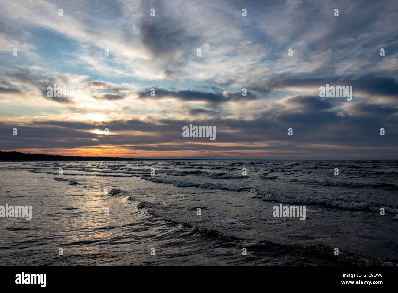 Sunset over the waves hi-res stock photography and images - Alamy