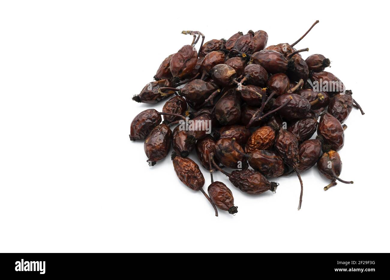 Ripe and dried rose hips isolated on white background Stock Photo