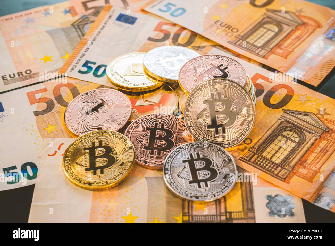 Bitcoin BTC coins on bills of euro banknotes. Worldwide virtual internet  cryptocurrency and digital payment system. Digital coin crypto money on  bitco Stock Photo - Alamy