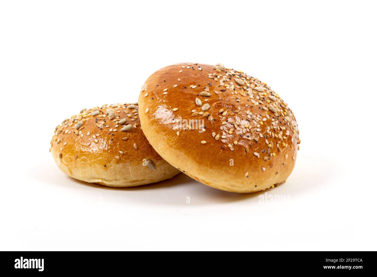 Bun's for homemade hamburger - studio shot on white background. Stock Photo