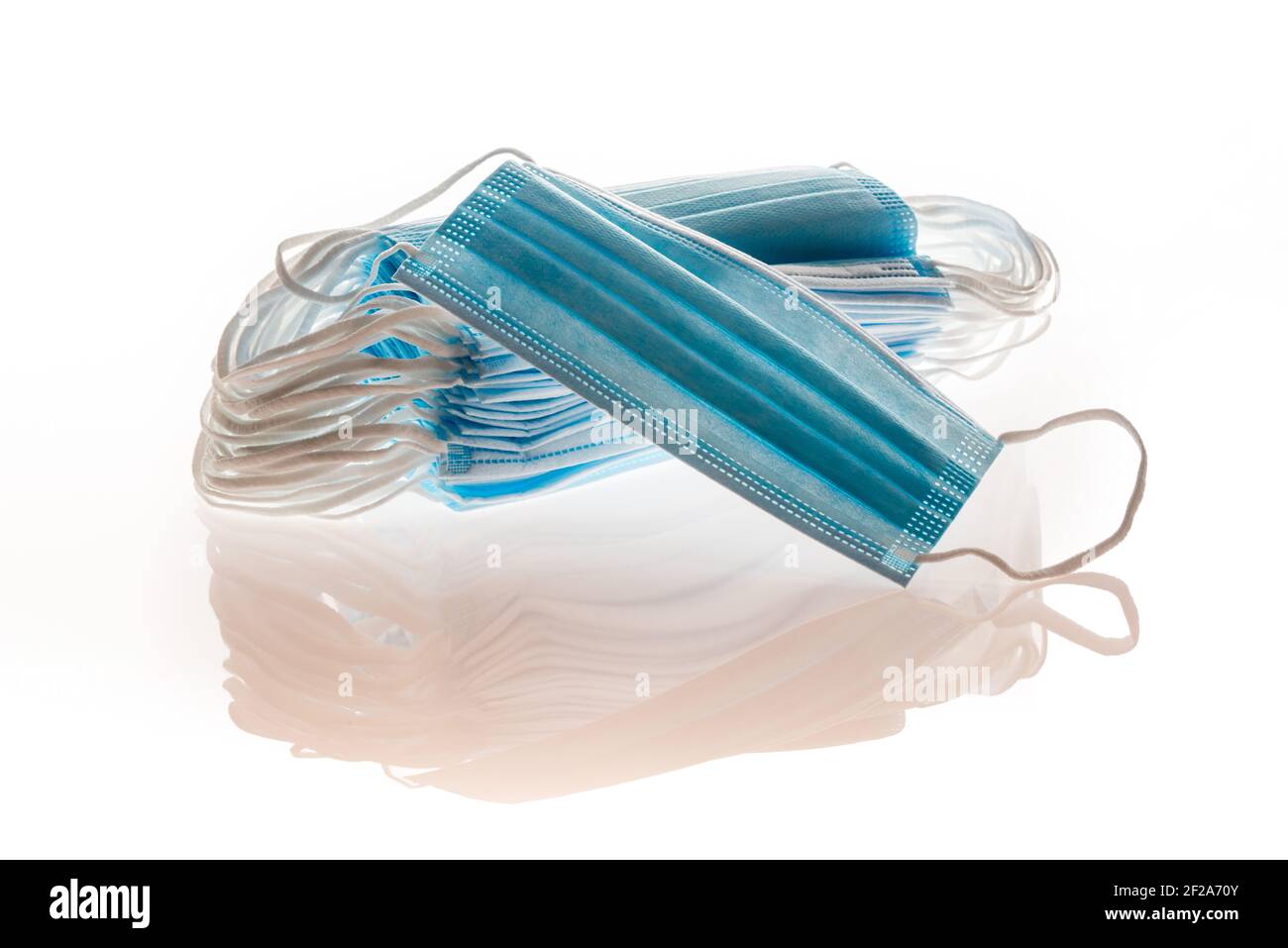 Blue medical masks, as protection against viruses, isolated on white