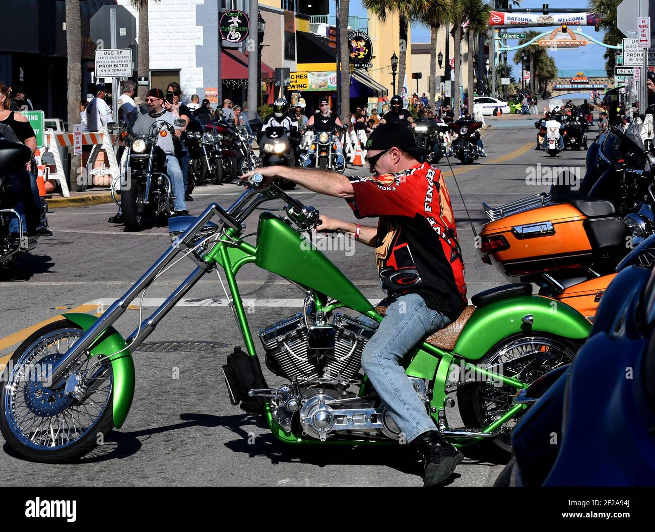 Daytona Beach, United States. 10th Mar, 2021. Motorcyclists ride down Main Street during the 80th year of Daytona Beach's annual Bike Week event. Few people were seen wearing face masks or practicing social distancing and some worry the gathering could become a superspreader event as the coronavirus pandemic continues. Credit: SOPA Images Limited/Alamy Live News Stock Photo