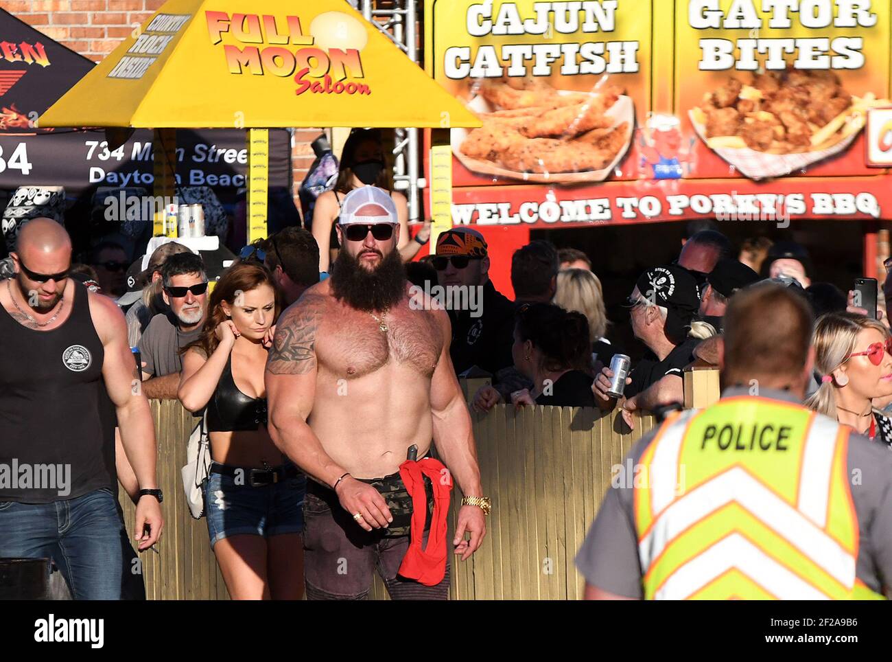 People gather at the Full Moon Saloon on Main Street during the 80th year of Daytona Beach's annual Bike Week event. Few people were seen wearing face masks or practicing social distancing and some worry the gathering could become a superspreader event as the coronavirus pandemic continues. (Photo by Paul Hennessy / SOPA Images/Sipa USA) Stock Photo