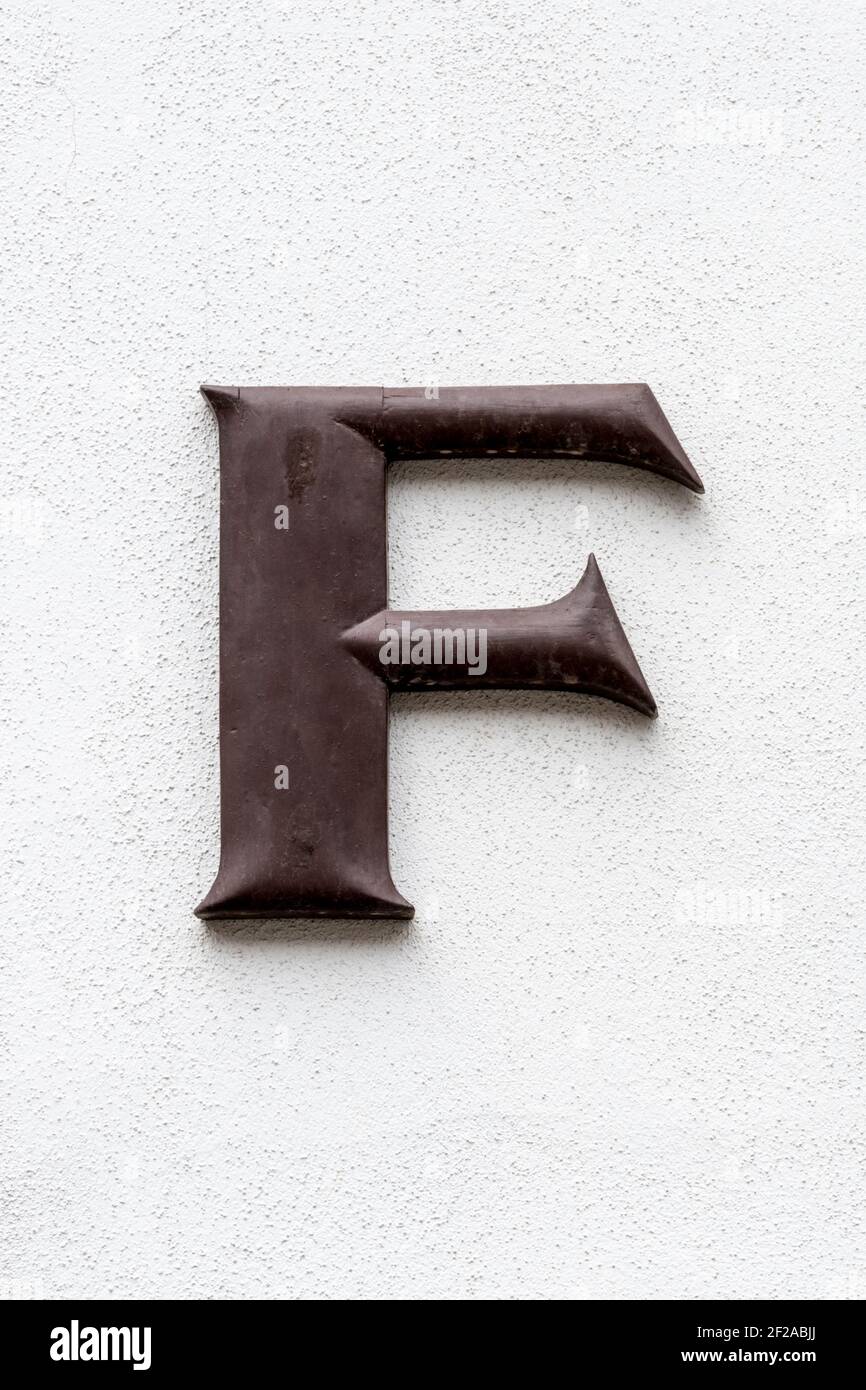 Brown wooden letter F Stock Photo