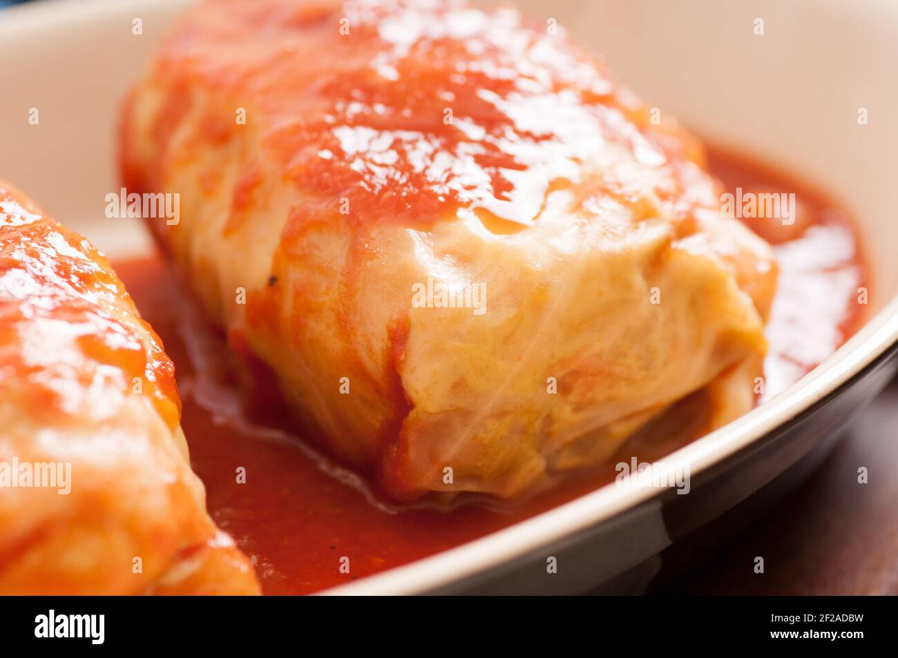 homemade pork cabbage rollswith spicy tomato sauce Stock Photo Alamy
