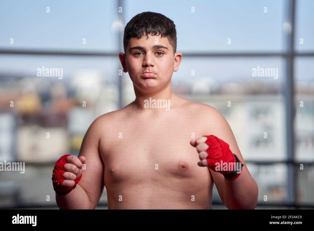 Young overweight confident boxer posing in the gym Stock Photo Alamy