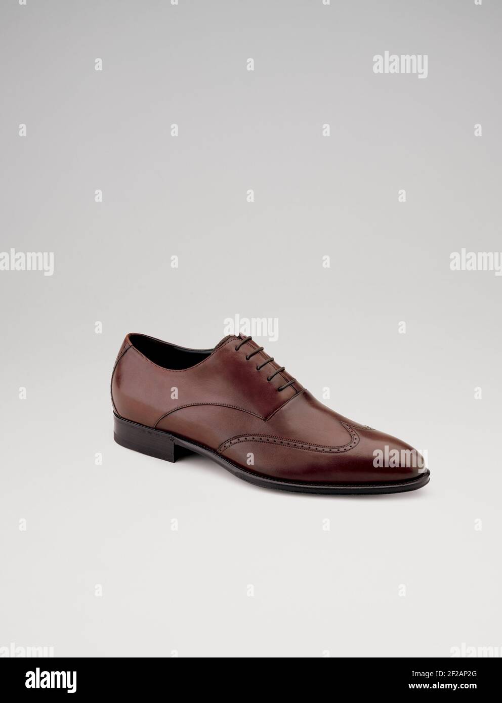 Elegant footwear personal accessory for men. Steel life studio shoot. Stock Photo