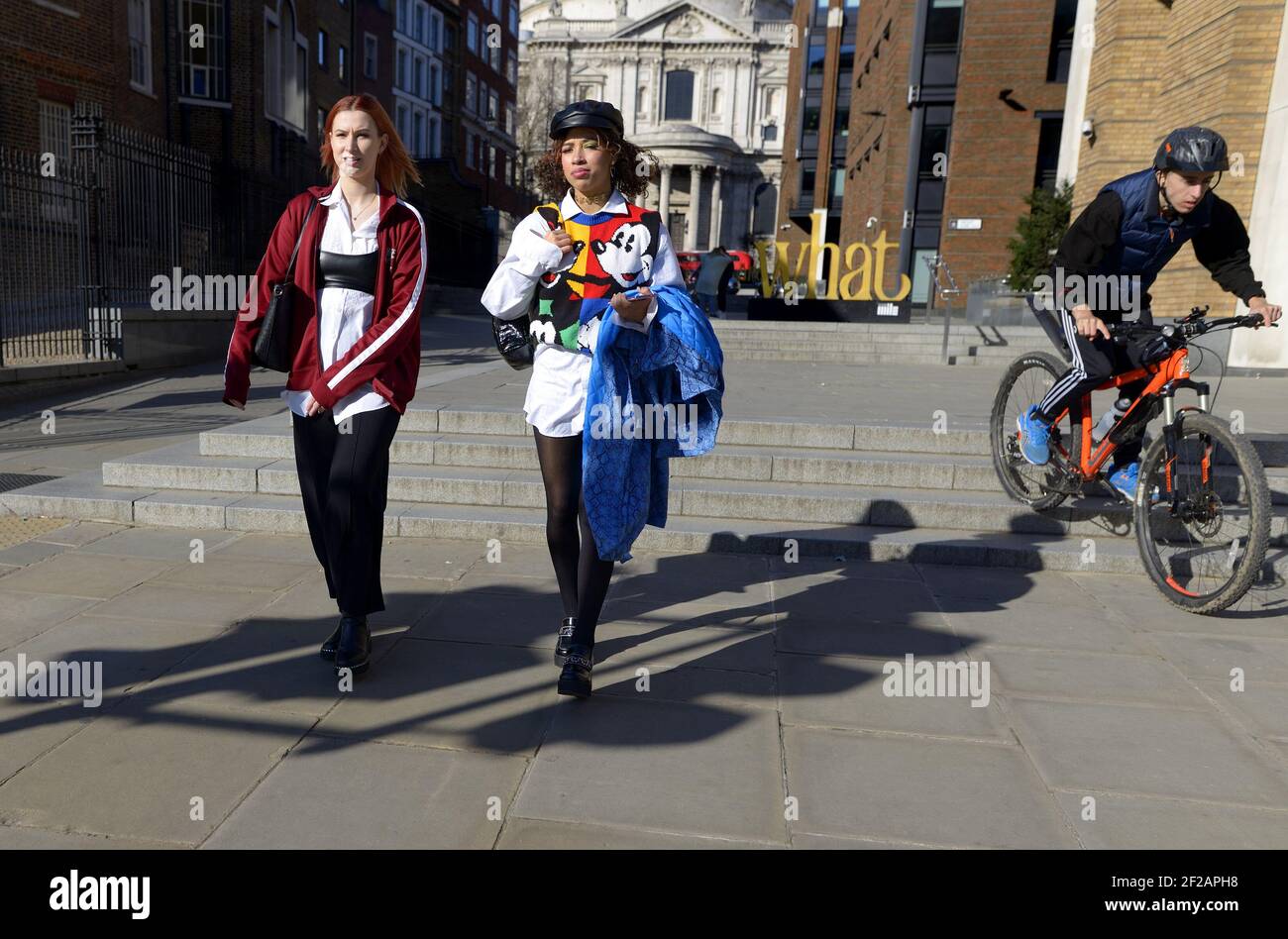 London, England, UK. Young women in St Peter's Hill in the City of London Stock Photo