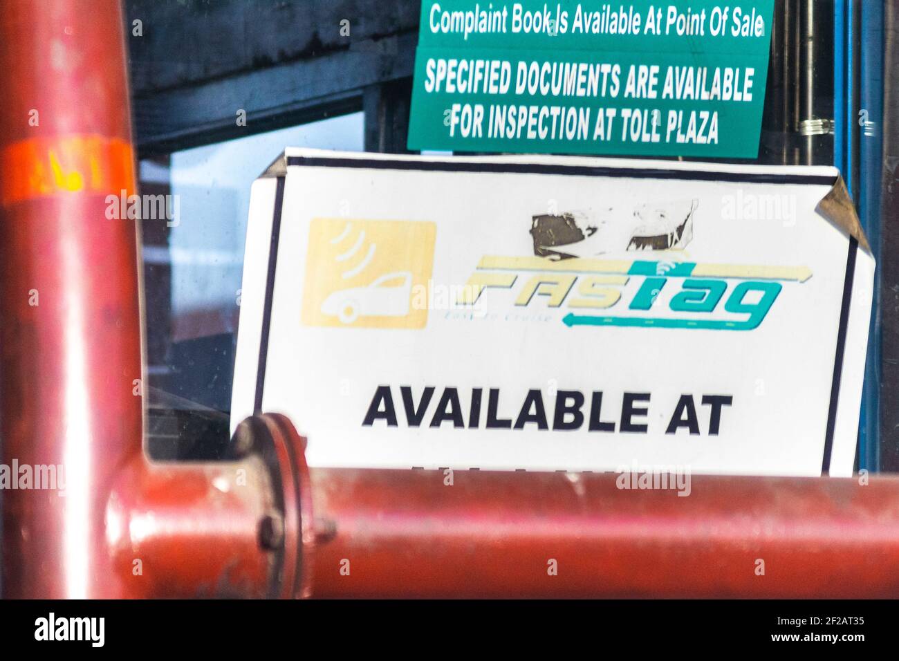 Fast Tag available sign near a toll booth showing the new cashless RFID based FASTag payment