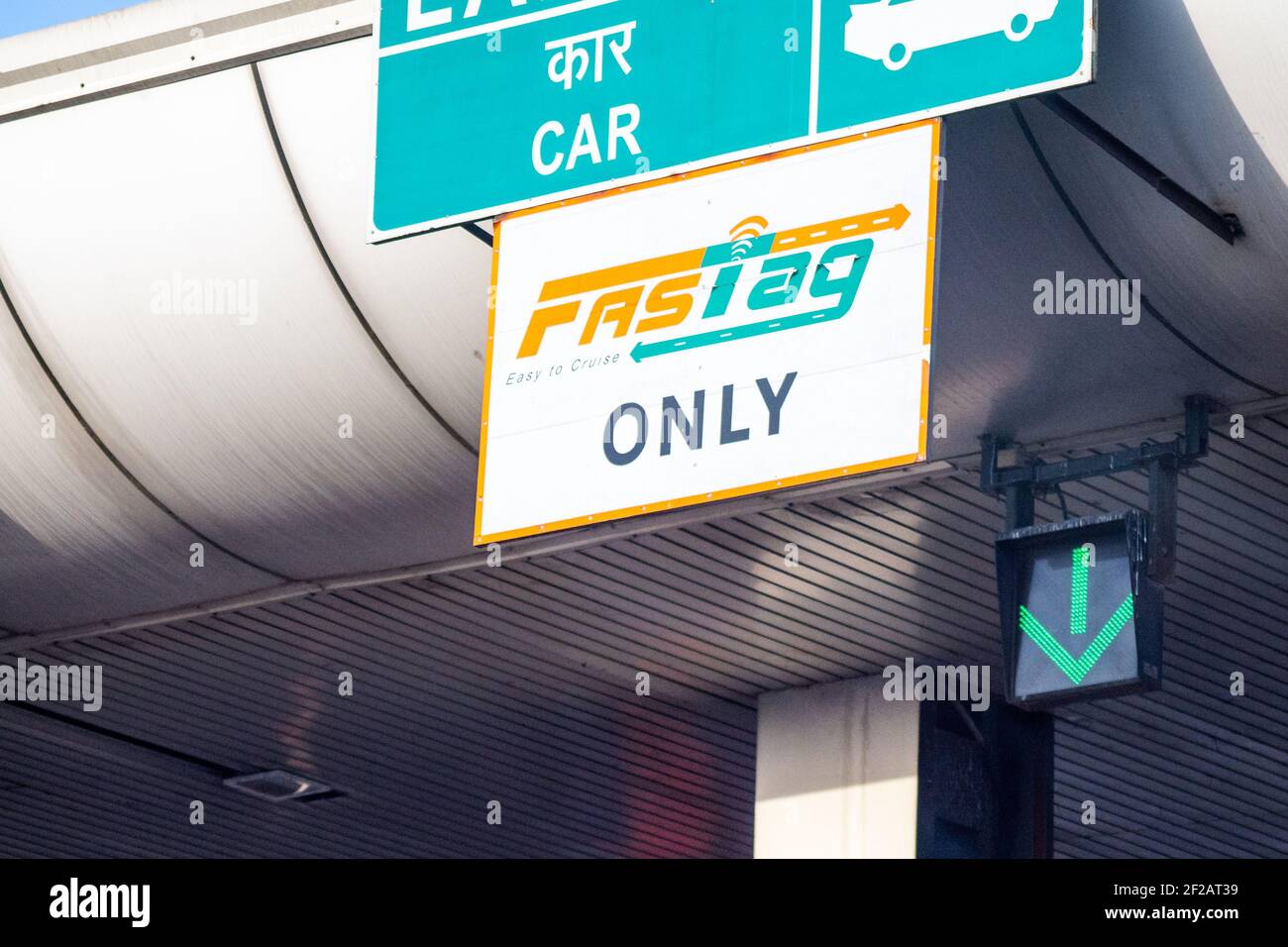 Fast Tag sign near a toll booth showing the new cashless RFID based FASTag payment system made