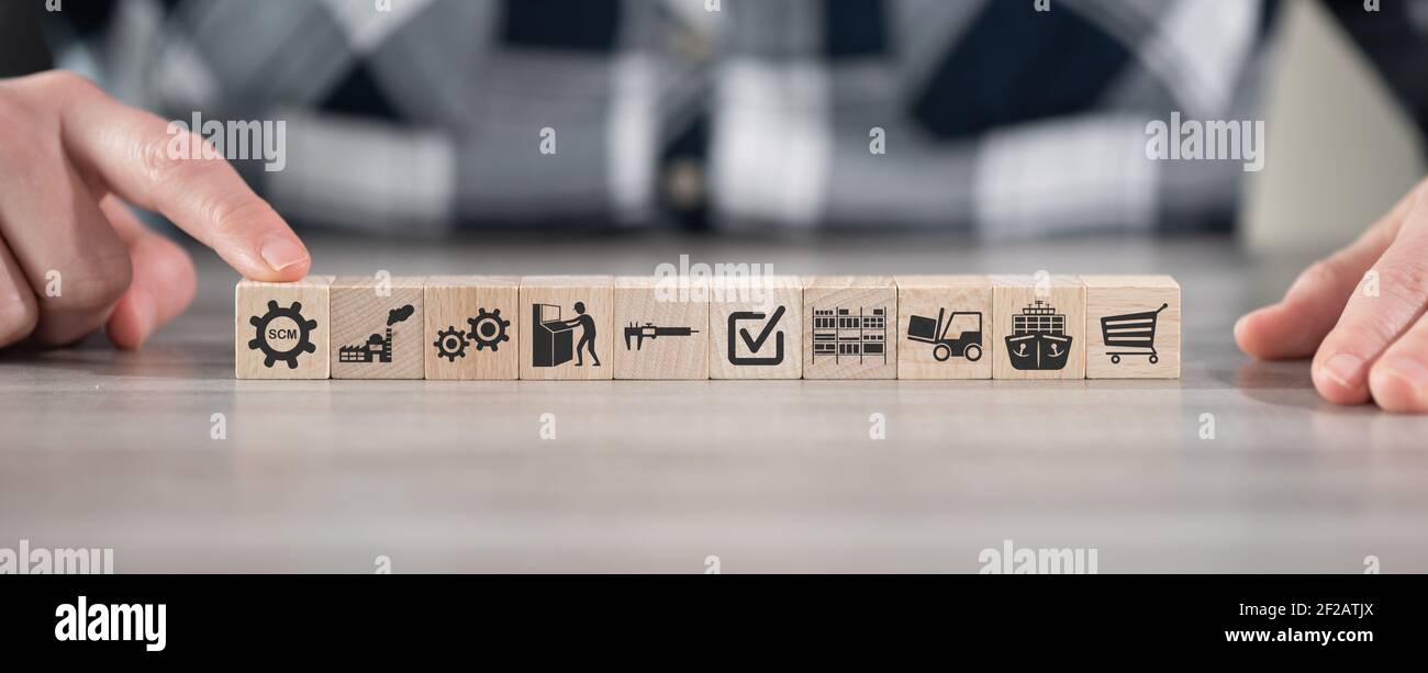 Concept of SCM with icons on wooden cubes Stock Photo - Alamy