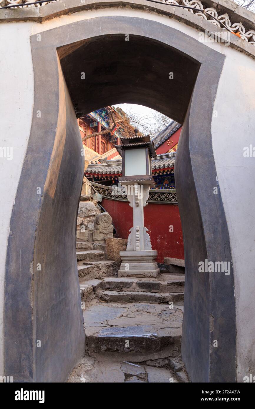 Beautiful ornamental gate at Behai park in Beijing, China. Stock Photo