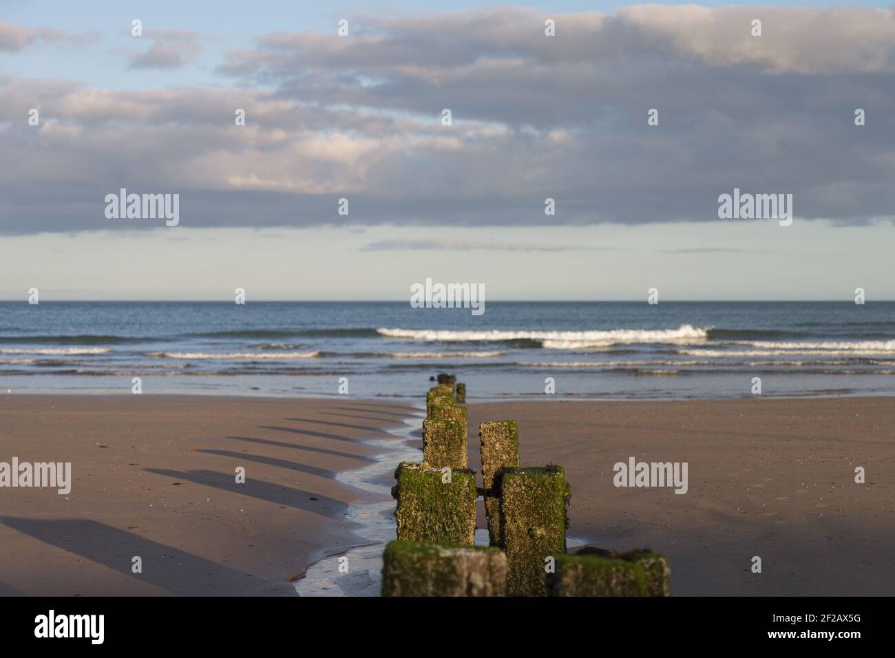 Wave Breakers on Youghal Beach, sea, wave, clouds, sandy beach, wave breaker, Stock Photo